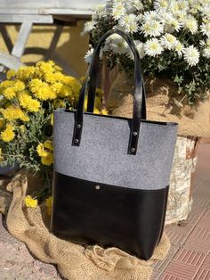 Grey felt and black vintage leather is the most beautiful combination of colours and materials. This felt tote has a simple design but at the same time elegant look. It is made of high quality wool felt that is so soft to touch and vintage black leather that in time will get individual patina. The bag is lightweight, thanks to high quality felt but it is quite large for a laptop or camera. Description: -zipper closure - leather pocket inside -two pockets outside (look at the pictures) - lether h Womens Work Bag, Felt Tote Bag, Convertible Tote Bag, Felt Tote, Leather Tote Bag Women, Leather Weekender Bag, Laptop Tote Bag, Laptop Bag For Women, Laptop Tote