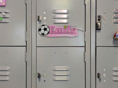 two lockers with magnets on the doors and one has a soccer ball