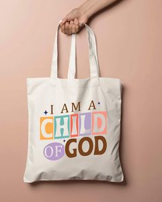 "Beautifully made Christian tote bag for all of our amazing Christians out there! This cutest, meaningful Christian tote is the perfect bag for daily aesthetic and daily use. ❤️   This 100% cotton bag comes in one size - 15\" x 16\"- perfect for everyday wear. While the canvas material will show off your designs in great colors, it's durable and will last for years. The bag features 20\" handles (made from the same canvas), making it easy to carry even with a week's worth of shopping. .: 100% cotton canvas .: Heavy fabric (12 oz/yd² (406.9 g/m" Eco-friendly White Shoulder Bag, Rectangular Recyclable Canvas Bag Gift, Large White Canvas Bag For Gifts, Large White Canvas Bag For Gift, Large White Canvas Bag Gift, White Recyclable Canvas Bag As Gift, Eco-friendly Bags With Letter Print For Gifts, Eco-friendly Bag With Letter Print For Gift, Recyclable Tote Canvas Bag For Gifts