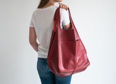 "Oversized Bag - Large Leather Tote Bag - XXL Handbag OVERSIZE STYLISH TOTE BAG made from high quality natural leather. Very roomy interior provides a lot of space for all the daily essentials and more. It is large enough to hold all your weekend essentials. This bag is a great option as your everyday bag. It can fit A4 files, books, magazines, cosmetic bag, accessories, your Macbook / Ipad and other electronic devides. Inside there are 2 pockets for mobile phone and another one with zipper for Red Leather Bucket Bag For On-the-go, Large Capacity Red Leather Satchel, Large Capacity Red Leather Backpack For Everyday Use, Red Leather Backpack For Everyday Use With Large Capacity, Red Leather Satchel With Large Capacity, Large Capacity Burgundy Bag For On-the-go, Burgundy Large Capacity Bag For On-the-go, Burgundy Large-capacity Bag For On-the-go, Burgundy Soft Leather Bag For Everyday Use