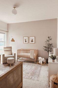 a baby's room with a crib and rocking chair