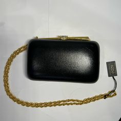 This Is A Brand New Rodo Crossbody Clutch Purse Manufactured In Milan Italy. It Is Made Out Of Black Leather And Has Hints Of Gold. Perfect For Formal Events Such As Weddings, Dinners, Etc. Feel Free To Reach Out With Any Offers Or Questions! Black Leather Clutch For Formal Occasions, Formal Black Leather Clutch, Leather Evening Bag With Chain Strap For Party, Leather Clutch With Chain Strap For Night Out, Black Luxe Bag For Formal Occasions, Designer Black Evening Bag For Events, Luxury Black Bags For Gala, Designer Black Evening Bag For Party, Designer Leather Clutch For Party