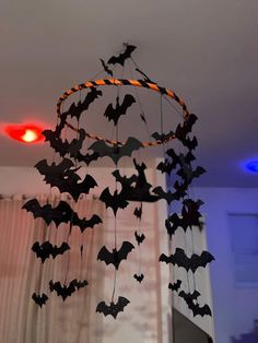 a wind chime with bats hanging from it