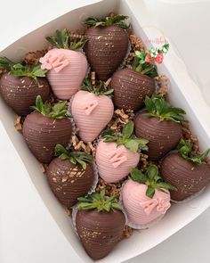 a box filled with chocolate covered strawberries