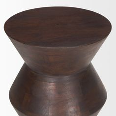 a wooden table with a round top on white background