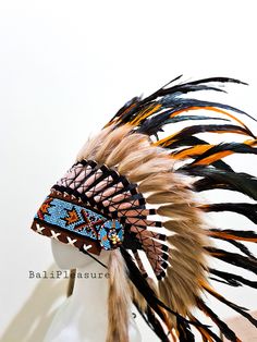 Orange Feather Indian Headdress Replica This Headdress is 100% handmade from feathers. * Head circumference: 59 centimeters / 23 inches * Length : Short * Beads color and pattern may vary each headdress WHY US? * 100% Handmade and Eco Friendly Product * Finest Quality - Each item will go through a Quality Control process before shipping. * No Markup Price * Every purchase supports Balinese Artisans - All Artisans will keep on following their passions while providing for their families. SHIPPING Bohemian Brown Costume Hats And Headpieces For Festivals, Festival Costume Hats And Headpieces With Feathers, Festival Feathered Costume Hat, Festival Costume Hat With Feathers, Indian Hat, Eco Friendly Product, Native American Feathers, Festival Costume, Indian Headdress