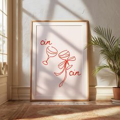 an art print with the word cin on it in front of a potted plant