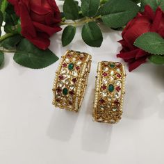 Indian Ethnic Pachi Ahemdabadi Kundan 22 Carat Gold Plated Bangles Set * This Bangle Set Is made up with High Quality Pachi Kundan * 22 Carat Gold Plating Is used * High Quality Beads Are used * Set includes two Bangles We offer a wide variety of products from heavy necklaces to hath fool and gorgeous mathapattis. We also have customised exclusive designs for brides around the globe. Be it your engagement, wedding or a reception party We have a variety of wedding jewellery options for you. We are open to customization as per their clients choice and always leave a great warm impression on Our clients face. Designs Offered: Semi Precious Jewellery . Kundan Kada, Kundan Bangles, Bangles Set, 22 Carat Gold, Gold Plated Bangles, Bangles Indian, Reception Party, Semi Precious Jewelry, Wedding Jewellery