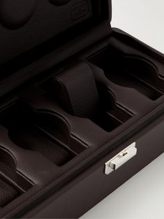 Scatola Del Tempo's watch boxes are a work of art. This version has been crafted in Italy from supple full-grain leather with four sections that are ergonomically designed to cradle each timepiece. Keep it displayed on your dresser so you can rotate through your favourites during the week. Luxury Business Watch Accessories With Rectangular Case, Luxury Round Case For Formal Occasions, Brown Rectangular Watch Accessories For Formal Occasions, Formal Brown Rectangular Watch Accessories, Formal Leather Watch With Round Case, Formal Leather Round Case, Elegant Round Business Case, Luxury Formal Cases With Smooth Grain, Classic Rectangular Case Watches For Formal Occasions