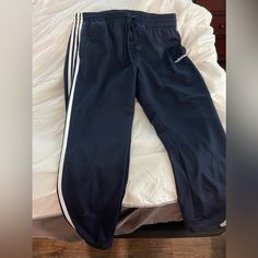 Navy Blue, Jogger Style Women’s Athleisure Pants. Brand New With Tags. Sporty Adidas Sweatpants With Elastic Waistband, Athleisure Three Stripes Joggers For Loungewear, Blue Adidas Activewear For Jogging, Adidas Relaxed Fit Bottoms For Jogging, Adidas Relaxed Fit Moisture-wicking Bottoms, Athleisure Pants With Three Stripes For Loungewear, Navy Relaxed Fit Jogging Bottoms, Athleisure Loungewear Pants With Three Stripes, Adidas Sweatpants For Loungewear In Athleisure Style