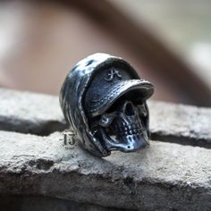 Handmade Rock n roll jewelry like you've never seen before. Grab yours NOW or cry later. Best attention to detail. Article name : RAP BOY Environmentally friendly metal made with passion and great attention to detail 🔨 Very comfortable to wear daily and in any occasion 🖤💍 Shipped from Jakarta, Indonesia Standard shipping use USPS ( US Customers ) Singapore post ( Rest of the world ) Express shipping use DHL Express Note : Please put a phone number in a note for DHL Express, it needs to requir Adjustable Metal Skull Ring, Adjustable Unique Metal Skull Ring, Adjustable Gothic Skull Ring Collectible, Adjustable Stainless Steel Skull Ring, Adjustable Silver Skull Ring Punk Style, Symbolic Metal Skull Ring For Collectors, Adjustable Silver Skull Ring In Punk Style, Handmade Adjustable Vintage Skull Ring, Vintage Adjustable Black Skull Ring