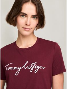 Tommy Hilfiger women's T-shirt. Made from soft, lightweight cotton our signature logo crewneck tee adds Hilfiger style to your casual wardrobe.  Material: 100% Regenerative Cotton. Trendy Tops With Embroidered Logo, Casual Tommy Hilfiger Tops With Embroidered Logo, Trendy Tommy Hilfiger Cotton T-shirt, Tommy Hilfiger Logo Print T-shirt For Spring, Tommy Hilfiger Logo Print Spring T-shirt, Trendy Tommy Hilfiger Crew Neck Top, Tommy Hilfiger Women, Signature Logo, Casual Wardrobe