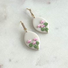 🌸 Dainty Lotus / waterlily florals on an off-white background earrings - Each petal is made from polymer clay and placed one by one with a needle, long process that requires a lot of patience. Perfect earrings for flower lover who values handmade creations, thoughtful birthday present. 🌸 July birth flower meaning - Water lilies hold various meanings in different cultures, one of which symbolise purity, unity and finding peace and balance ️ Choose between dangle and stud variation.  🌸 Specific Lotus Polymer Clay Earrings, Feminine White Hypoallergenic Earrings, Delicate Handmade Petal Earrings, Whimsical White Jewelry With Flower Charm, Delicate White Teardrop Flower Earrings, White Feminine Everyday Earrings, Botanical Style White Birth Flower Jewelry, Feminine White Everyday Earrings, Handmade White Flower Earrings Nature-inspired