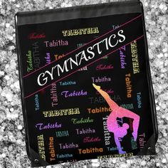 a black bag with the words gymnastics on it and a woman doing a splitstand