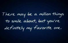 the words are written in white ink on a dark blue background, and there may be a million things to smile about but you're definitely my favorite one