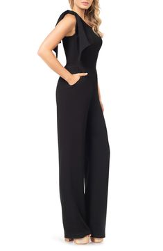 An elegant one-shoulder neckline and figure-skimming silhouette style a sophisticated jumpsuit with two panels that cascade over the single shoulder. 63 1/2" length; 34" inseam; 22 1/2" leg opening (size Medium) One-shoulder neck Sleeveless Lined 97% polyester, 3% spandex Dry clean Imported Elegant Full-length Strapless Jumpsuit For Party, Elegant Black Jumpsuits And Rompers For Gala, Elegant Strapless Jumpsuit For Night Out, Elegant Solid Strapless Jumpsuit For Evening, Elegant Formal Strapless Jumpsuit, Elegant Black Strapless Jumpsuit For Evening, Elegant One-shoulder Fitted Jumpsuit, Evening Fitted Jumpsuit With Asymmetrical Neckline, Fitted Evening Jumpsuit With Asymmetrical Neckline