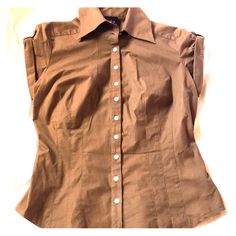 Nwot Capped Sleeved Button Down 2b Bebe Top In Brownie Color. Stretchy Fit 3% Spandex 97% Cotton. Body Hugging And Thick Stretchy Material Makes It Very Figure Flattering. Also In Melon Color Size Med Nwt In Pictures For Reference Only (Separate Listing). Bundle For Discounts!! Brown Tops With Button Closure For Work, Brown Button Closure Tops For Work, Brown Workwear Tops With Button Closure, Classic Brown Tops With Button Closure, Brown Buttoned Top For Office, Brown Cotton Top For Office, Brown Cotton Office Top, Brown Cotton Tops For Office, Classic Fitted Top With Snap Buttons