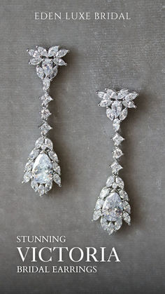 two diamond earrings with the words stunning victoria bridal earings written below each drop