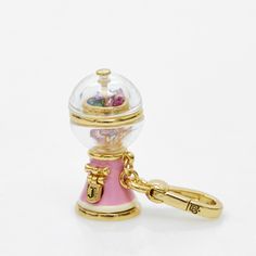 Indulge in nostalgia with our Candy Machine Pendant. A miniature marvel with vibrant colors and vintage charm, it dispenses sweetness and whimsy in equal measure, adorning your ensemble with a touch of playfulness. Collection: Retro Aesthetic Charm Product Type: Pendant, Necklace (with chain) Material: 18k gold plating brass and enamel Dimensions: Height: 31 mm, Width: 13 mm Aesthetic Keyrings, Juicy Charms, Vintage Trinkets, Pretty Jewelry Necklaces, Sweet Jewelry, Candy Jewelry, Juicy Couture Charms, Mini Things, Funky Jewelry