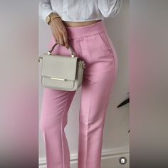 Zara New With Tags Ankle Pants Pink High-Waisted Pants With Side Pockets And Back False Welt Pockets. Front Zip, Metal Hook, And Interior Button Closure. Color Pink Outer Shell 55% Cotton 42% Polyester 3% Elastane Blogger's Favorite Already Sold Out At Store And Online. All Sales Are Final. No Returns. Please Ask All Questions Before Purchasing. Thank You For Looking Fitted Ankle-length Solid Color Pants, Solid Color Ankle-length Office Pants, Non-stretch Spring Dress Pants, Trendy Spring Pants In Solid Color, Trendy Solid Color Spring Pants, Trendy High Waist Wide Leg Office Pants, Fitted Summer Office Bottoms, Fitted Solid Color Pants For Spring, Fitted Office Lady Bottoms For Summer