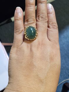 You are viewing a beautiful 14k mings green translucent jade cabochon ring. The total weight of the ring is approx.8.6 grams. The ring size approx.5 3/4 can size up or down. The ring itself measures approx.21mm x 19mm wide. Beautiful green jade translucent cabochon. Send me a message if you have any question. MAKE AN OFFER Yellow Gold Jade Cabochon Ring, Green Emerald Oval Cabochon Ring Stamped 14k, Cabochon Ring, Ring Photos, Jade Pendant, Green Jade, Jade Green, Ring Gift, Vintage Rings