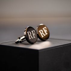 This listing is for a pair of custom engraved metal cuff links. Engraving: * Choose any of our design styles or you can send us your own design Cufflinks Colors: * Gunmetal, Gold, Silver, Rose Gold Packaging Options: * No Box or Black Flip Box ♦ ORDER WORK FLOW: ♦ 1. Include engraving details on the Personalization box in the listing or message us after purchase (please include order number). 2. Once we have all your info, we'll send you a mock-up of your product - we allow up to 3 rounds of des Black Cufflinks For Wedding And Father's Day, Classic Black Cufflinks For Father's Day, Modern Black Wedding Cufflinks, Engraved Cufflinks For Business And Father's Day, Silver Cufflinks With Gift Box For Father's Day, Black Polished Finish Cufflinks For Wedding, Black Polished Cufflinks For Wedding, Wedding Black Cufflinks With Polished Finish, Wedding Black Polished Finish Cufflinks