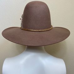 Mexican Handcrafted Wide Brim Cowboy Hat | Lucky7 Tobacco Just Different! A complete head-turner & unique Men & Women Mexican artisan hat on this wool felt Tejana-form in Tobacco color with its 7 symbolical Gold-dipped accessories, steel accessories, & leather hat-band. SIZE See “Size Chart” below, or CLICK HERE DETAILS Sombrero Box Inner-elastic band (comfortable sizing) Brown Top Hat With Curved Brim For Western-themed Events, Brown Wool Hat For Western-themed Events, Brown Curved Brim Top Hat For Western-themed Events, Brown Wool Hat For Ranch, Brown Wool Hat Band For Western-themed Events, Brown Curved Brim Top Hat For Kentucky Derby, Brown Flat Crown Felt Hat For Country Events, Brown Felt Hat With Flat Crown For Country Events, Artisan Wide Brim Brown Top Hat