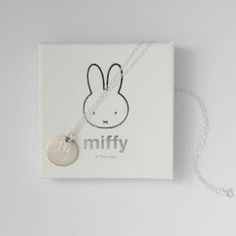 * Our Miffy Personalised Disc Necklace is understated, simple and sophisticated, making your moments memorable. * This minimal Miffy disc pendant has been handcrafted in sterling silver and will beautifully catch the light whenever you wear it.  * This personalised necklace makes the perfect base for layering and is suspended from a fine sterling silver necklace. *Please note: that the number of characters on an engravable item is limited to six or ten characters or one date. Please see our illustrations, and if in doubt, do email us to check. If you choose the Birth sign, no other engraving can be added due to space.  Material: Sterling Silver Colour Silver Chain length & style: 45cm Disc Charm:  Secure clasp fastening Hand-engraved in our London workshop Sent with love in a Miffy gift bo Minimalist Hand Stamped Charm Necklace As Gift, Minimalist Hypoallergenic Charm Necklace For Everyday, Sterling Silver Minimalist Initial Pendant Charm Necklace, Personalized Minimalist Sterling Silver Charm Necklaces, Minimalist Round Pendant Charm Necklace For Mother's Day, Minimalist Adjustable Hand Stamped Charm Necklaces, Minimalist Hand Stamped Round Pendant Necklace, Hypoallergenic Sterling Silver Charm Necklace For Birthday, Sterling Silver Hand Stamped Round Disc Necklace