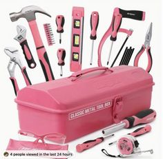 a pink tool box with tools in it