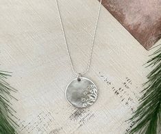 A beautiful Flower hand stamped Sterling silver charm on a dainty 24"Sterling silver chain. Perfect gift for flower lovers. Silver Flower Pendant Charm Necklace For Everyday, Silver Everyday Charm Necklaces With Flower Charm, Silver Flower Charm Necklace For Everyday, Silver Charm Necklace With Flower Charm For Everyday, Everyday Silver Charm Necklace With Flower, Delicate Silver Charm Necklace With Flower, Silver Charm Necklace With Flower Charm, Dainty Stamped Silver Charm Necklace, Dainty Silver Stamped Charm Necklace