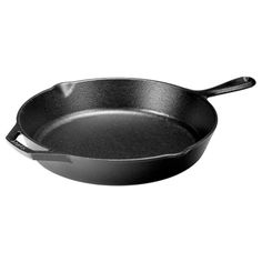 an empty frying pan on a white background