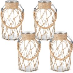 four glass jars with rope wrapped around them