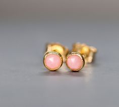 Rose Cut Pink Opal stud earrings, October birthstone gift for Love and Abundance. Subtle Wedding Earrings. Valentine's Day Gift. Every piece of jewellery tells a story, especially the jewellery you choose to celebrate the special events of your life. Treasured moments of wedding days, anniversaries and birthdays can be remembered in a beautiful piece of handmade, bespoke jewellery. This precious Pink Opal sparkles from the centre of a delicate 14k gold filled bezel cup stud setting. These natura Delicate Birthstone Earrings For Wedding, Pink Wedding Earrings With Birthstone, Dainty Pink Earrings For Anniversary, Opal Stud Earrings, Opal Wedding, Tourmaline Bracelet, Opal Earrings Stud, Opal Studs, Small Earrings Studs