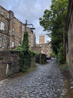 an old cobblestone street in the city