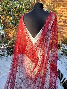 Indulge in the opulence of our Wine Red Cathedral Wedding Bridal Cape Veil. Exquisitely designed with intricate beadwork and luxurious sequins, this stunning cape veil will make you feel like a true vision walking down the aisle. Crafted from high-quality materials, it drapes elegantly around your shoulders, adding a touch of old-world charm to your bridal ensemble. The rich wine red hue adds a pop of colour, creating a sense of effortless sophistication. Perfect for a romantic and glamorous wed Red Cathedral, Bridal Cape Veil, Bridal Cloak, Victorian Inspired Fashion, Cape Veil, Quinceañera Dresses, Ruby Wedding Anniversary, Cathedral Wedding, Ruby Wedding