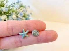 Gift for people who likes Ocean Sea! Do you have a friend who enjoys summer beach water activities? These pair of Shell and Starfish earring is perfect for her! This Beach Ocean Style Earring is also perfect to wear when you go to aquarium or sea park events. They are also wonderful gifts for people who likes Mermaid. [Clip on earrings option available  [All the photos are taken by us with real products. All rights are reserved] ♥ Details ♥ Starfish: Length: 1.2 Centimeters, Width: 1.2 Centimete Ocean-inspired Earrings For Summer Gift, Summer Starfish Charm Earrings Gift, Silver Starfish Earrings For Summer, Shell-shaped Earrings For Beach Season Gift, Crystal Seashells, Ocean Style, Ocean Earrings, Sea Jewelry, Ocean Fashion