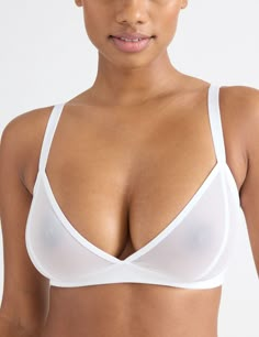 Made with sheer, soft and super sexy single layer mesh. With a deep V neckline perfect for slaying and layering with low-cut tops. Note: this style is made with translucent fabric so nipples will be visible | Knix Mesh Deep V Bra in White Ddd Bra, Panties Pattern, Sheer Bras, Translucent Fabric, Deep V Bra, Wireless Bras, Mesh Sports Bra, Dope Fits, Low Cut Top