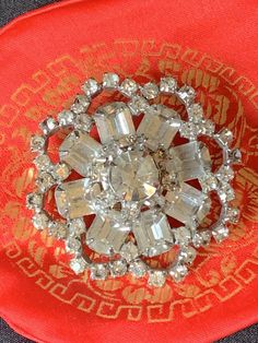 "Rhinestone Pin, rhinestone Jewelry, Dress Brooch, Ladies Pin, Vintage fashion, Vintage Party Pin,Cocktail Pin,Costume Jewelry,Crystal Diamente Brooch 2\" x 2\". No stones missing. No maker Great vintage condition. Stunning classic design. We refund shipping over $2. Ask about international shipping. Check out: Instagram: https://www.instagram.com/rusticbuckets/ Facebook: https://www.facebook.com/rusticbuckets Pinterest: @rusticbuckets Our sister store Rustic Buckets South for more items: https: Crystal Rhinestone Brooches For Costume Jewelry, Crystal Rhinestone Brooches Costume Jewelry, Party Crystal Brooches Costume Jewelry, Formal Crystal Rhinestone Brooches, Crystal Brooches With Rhinestones For Anniversary, Formal Crystal Brooches With Rhinestones, Crystal Brooches With Sparkling Stones For Party, Party Brooches With Sparkling Crystal Stones, Party Crystal Brooches With Sparkling Stones