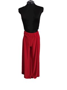 Beautifully made Palazzo pants. Made with dance in mind! They have extra wide legs and a soft elastic waist band for a firm fit. The material is 100% polyester with great stretch and a very light weight feel. These are long and should just touch above the floor. Check out our sizing chart in the photos to ensure you get the fit you want. Pants automatically come in our regular length size but if you fall within the short or long range of our chart please enter it in the personalization section w Stretch Bottoms With Elastic Waistband For Dancewear, Stretch Dancewear Bottoms With Elastic Waistband, Stretch Full Length Dance Bottoms, Stretch Harem Pants With Elastic Waistband For Yoga, Stretch Hip-length Bottoms For Dance, Full Length Dancewear Bottoms For Dance, Solid Stretch Full Length Harem Pants, Stretch Solid Color Wide-leg Harem Pants, Fitted Wide-leg Yoga Pants With Elastic Waistband