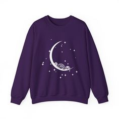 This cozy sweatshirt features a unique design of a crescent moon with roses surrounded by stars, giving off a mystical and romantic vibe. Perfect for those who love astrology, nature, and celestial themes, this sweatshirt is ideal for the colder months and adds a touch of magic to your wardrobe. Great for casual wear or lounging at home, this sweatshirt can be a thoughtful gift for those who appreciate celestial beauty. Product features - Made with a medium-heavy fabric blend of 50% cotton and 50% polyester for a cozy feel - Classic fit and crew neckline provide comfort and style - Double-needle stitching for durability - Ethically grown US cotton and sustainable production practices - No itchiness with gray, tear-away label Care instructions - Machine wash: cold (max 30C or 90F) - Non-chl Moon Shirts, Funny Couple Shirts, Love Astrology, Floral Moon, Coffee Sweatshirt, Moon Shirt, Gothic Clothing, Matching Tees, Boho Shirts