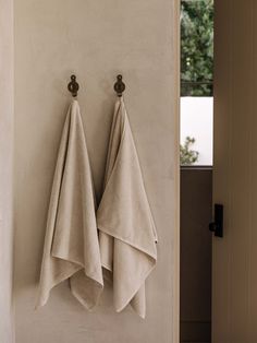 Add a designer touch to virtually any decor with the classic elegant design of the Roland Brass Hook. Use it for towels, umbrellas, jackets, hats, handbags, or jewelry. Dimensions: 4" H x 2.25" W x 2.25" D Material: Brass Mounting Hardware Included Bathroom Towel Hook Ideas, Hand Towel Hook, Sand Vase, Bathroom Towel Hook, Outdoor Furniture Sofa, Agate Coasters, Wood Pedestal, Brass Hook, Hanging Towels