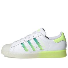 (WMNS) adidas originals Superstar 'White Yellow Green' GW4909 (SNKR/Skate/Casual/Low Top/Women's/Gradient) Trendy Adidas Streetwear Sneakers, Trendy Adidas Sneakers For Streetwear, Spring Low-top Skate Shoes With Boost Midsole, Trendy Adidas Sneakers With Logo, Spring Streetwear Skate Shoes With Boost Midsole, Spring Adidas Low-top Sneakers, Adidas Low-top Sneakers For Spring, Adidas Skate Shoes For Spring Streetwear, Adidas Sneakers For Spring Streetwear