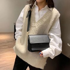 SPECIFICATIONSBrand Name: YogodlnsHandbags Type: Shoulder BagsTypes of bags: Shoulder & Crossbody BagsMain Material: PULining Material: PolyesterShape: FLAPPlace Of Origin: GUANG DONG ProvincePlace Of Origin: GUANG DONG ProvinceOrigin: Mainland ChinaCN: SichuanHardness: SOFTPattern Type: SolidInterior: No PocketDecoration: NONEExterior: NONEOccasion: VersatileClosure Type: haspGender: WOMENStyle: fashionNumber of Handles/Straps: SingleShoulder Bag: Vintage Shoulder Bag For WomenCrossbody Bag: PU Leather Crossbody BagSmall Square Bag: New Lady Small Square BagHandbag: Lady HandbagChoice: yessemi_Choice: yes The Small Things, Go To School, Clothing Catalog, Simple Chic, Shoulder Messenger Bag, Small Things, New Tops, Square Bag, Sweater Coats