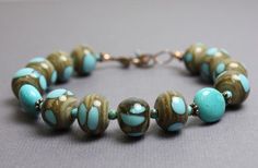 Turquoise Bracelet, Lampwork Bracelet, Turquoise and Brown Bracelet, Boho Bracelet, Turquoise Blue B Lampwork Bracelets, Turquoise And Brown, Chocolate Gold, Lampwork Jewelry, Blue Beaded Bracelets, Black Onyx Bracelet, Black Beaded Bracelets, Brown Bracelet, Onyx Jewelry