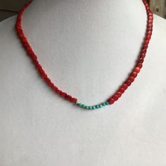 Pretty and colorful beach inspired necklace featuring Red Coral and a few Hubei Turquoise beads to add a pop of color. Clasp is a 14k gold filled Lobster claw. Beads are strung on 49 strand beading wire that is secured with 14k gold filled crimp, cover and wire guardians. Necklace is 18 inches Visit my shop for more jewelry designs: https://www.etsy.com/shop/EarthSeaSkyJewelry Artisan Beaded Necklace With Gemstone Beads For Beach, Handmade Southwestern Beaded Necklaces For Beach, Hippie Style Red Jewelry For Gift, Adjustable Single Strand Turquoise Bohemian Necklace, Bohemian Tiny Beads Turquoise Necklace For Beach, Hippie Beaded Necklaces With Gemstone Beads For Beach, Turquoise Single Strand Beaded Bohemian Necklace, Bohemian Turquoise Necklace With Tiny Beads For Beach, Turquoise Single Strand Beaded Necklace In Bohemian Style