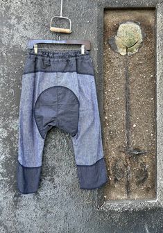 Baggy Denim Patchwork Pants, Relaxed Fit Denim Blue Patchwork Bottoms, Bohemian Style Denim Blue Cotton Pants, Relaxed Fit Denim Blue Patchwork Pants, Bohemian Denim Blue Cotton Pants, Baggy Cotton Patchwork Jeans, Baggy Patchwork Cotton Jeans, Baggy Patchwork Tapered Leg Pants, Baggy Patchwork Pants With Tapered Leg