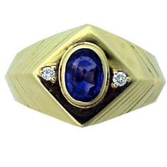 This estate lovely ring made in 14K yellow gold. This well crafted ring, showcases central oval 1.09 ct. sapphire accented by 2 diamonds (DTW is appro. 0.06ct.). Total weight is 7.85 gr. This gorgeous ring will attract admiration every time it is worn and is the perfect addition to any jewelry collection. Classic Yellow Gold Sapphire Ring Oval Cabochon, Timeless Oval Sapphire Ring Stamped 14k, Timeless 14k Stamped Oval Sapphire Ring, Classic Oval Sapphire Ring With Diamond Accents, Yellow Gold Sapphire Ring With Diamond Oval Cabochon, Yellow Gold Sapphire Diamond Ring With Oval Cabochon, Oval Cabochon Sapphire Ring In Yellow Gold With Diamond, Yellow Gold Oval Signet Ring With Diamond Accents, Formal Oval Sapphire Signet Ring