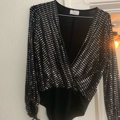 -Size Small -Sequin Bodysuit -Brand New -Perfect Condition -Never Worn Chic Sequined Bodysuit For Evening, Chic Evening Bodysuit With Sequins, Chic Sequined Evening Bodysuit, Elegant Sequined Bodysuit For Night Out, Chic Evening Sequined Bodysuit, Glamorous Long Sleeve Sequined Bodysuit, Elegant Long Sleeve Sequin Bodysuit, Black Sequin Bodysuit For Party, Sequin Bodysuit For Party Season