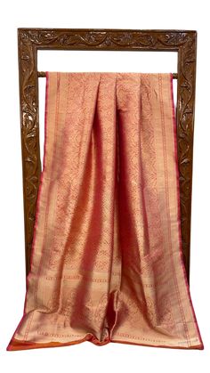 Banaras Silk Saree is a traditional Indian garment renowned for its luxurious fabric, intricate designs, and rich cultural heritage. These sarees are weaving craftsmanship. blouse size 38-42 The Silkmark of Banaras sarees is the zari work. Fine gold or silver threads are used to create elaborate, shimmering patterns that add a regal touch to the saree. The craftsmanship of the zari work is a key feature that distinguishes Banaras silk saree. Ceremonial Saree With Pallu For Transitional Season, Ceremonial Anarkali Silk Saree, Bollywood Style Ceremonial Silk Saree, Ceremonial Banarasi Silk Saree Blouse Piece, Anarkali Ceremonial Blouse Piece With Zari Weaving, Ceremonial Silk Saree With Cutdana, Navratri Ceremonial Tussar Silk Saree, Jamawar Dupatta With Weaving Work For Wedding, Tussar Silk Bollywood Saree For Ceremonial Occasions