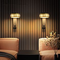 two couches and a table in front of a wall with vertical stripes on it